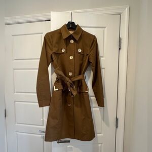 Michael Kors trench coat
New without tags
Never been worn